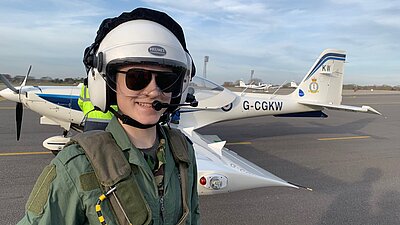 CCF RAF Section Cadet with plane 